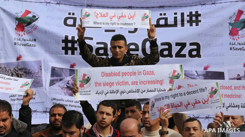 Wounded and disabled Palestinians take part in a protest against the siege on the Gaza Strip, at Erez crossing, in the northern Gaza Strip, on February 8, 2018. Israel has maintained a siege on Gaza for a decade which it...