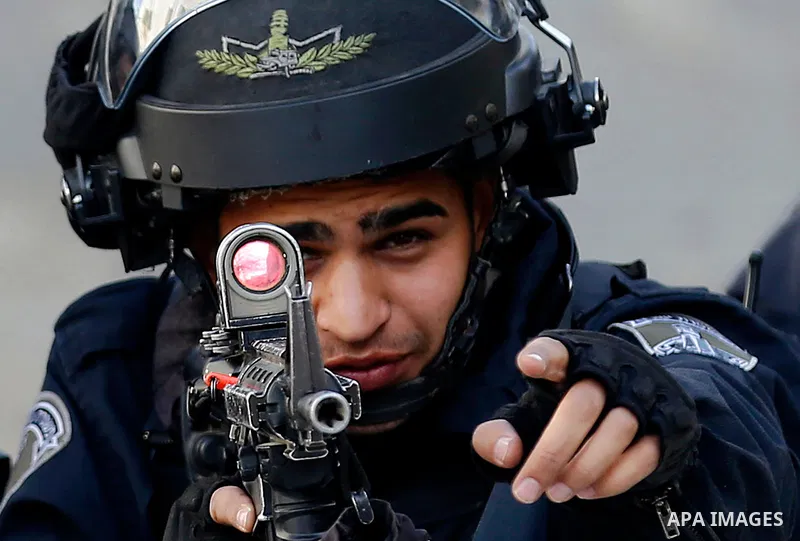 Israeli security froces take position during clashes with Palestinian protesters as demonstrations continue over US President Donald Trump's declaration of Jerusalem as Israel's capital, in the West Bank city of Hebron o...