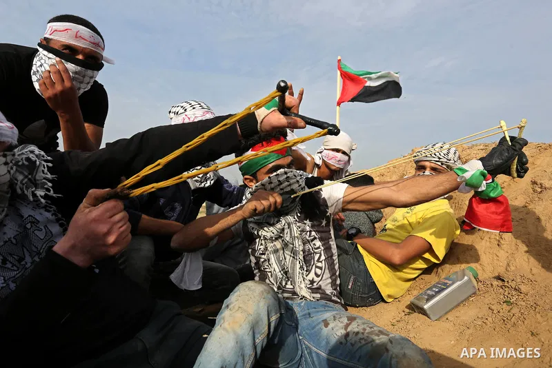 Palestinian protesters clash with Israeli security forces as demonstrations continue over US President Donald Trump's declaration of Jerusalem as Israel's capital near the border with Israel in the southern Gaza Strip Fe...
