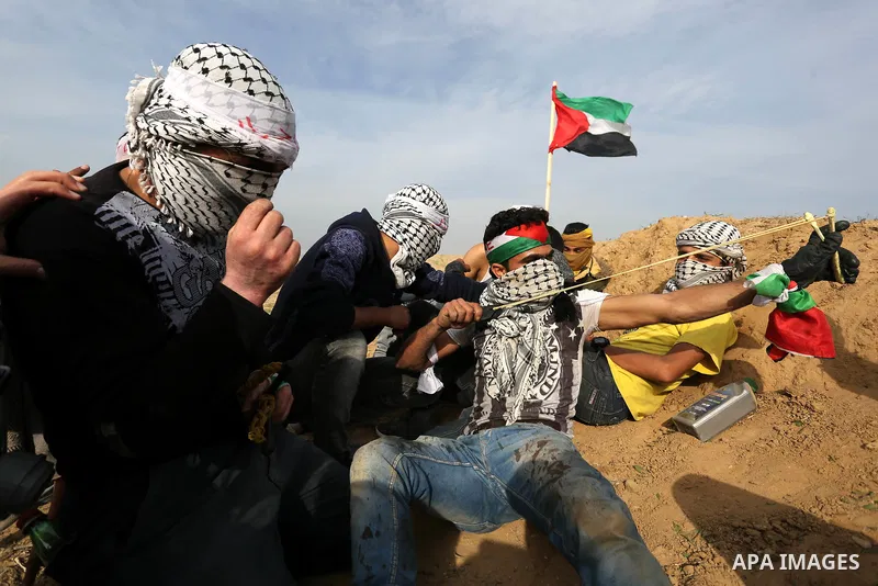 Palestinian protesters clash with Israeli security forces as demonstrations continue over US President Donald Trump's declaration of Jerusalem as Israel's capital near the border with Israel in the southern Gaza Strip Fe...