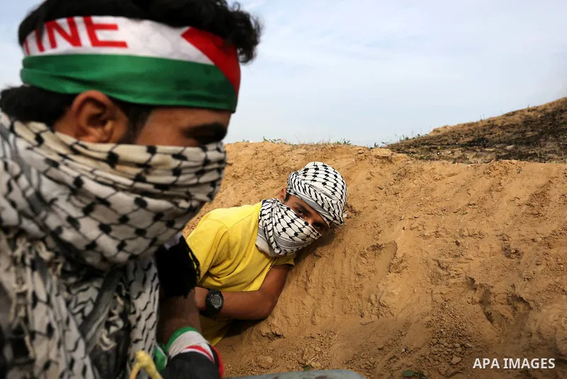 Palestinian protesters clash with Israeli security forces as demonstrations continue over US President Donald Trump's declaration of Jerusalem as Israel's capital near the border with Israel in the southern Gaza Strip Fe...