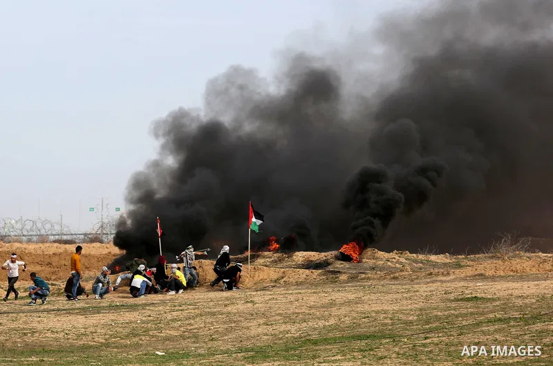 Palestinian protesters clash with Israeli security forces as demonstrations continue over US President Donald Trump's declaration of Jerusalem as Israel's capital near the border with Israel in the southern Gaza Strip Fe...