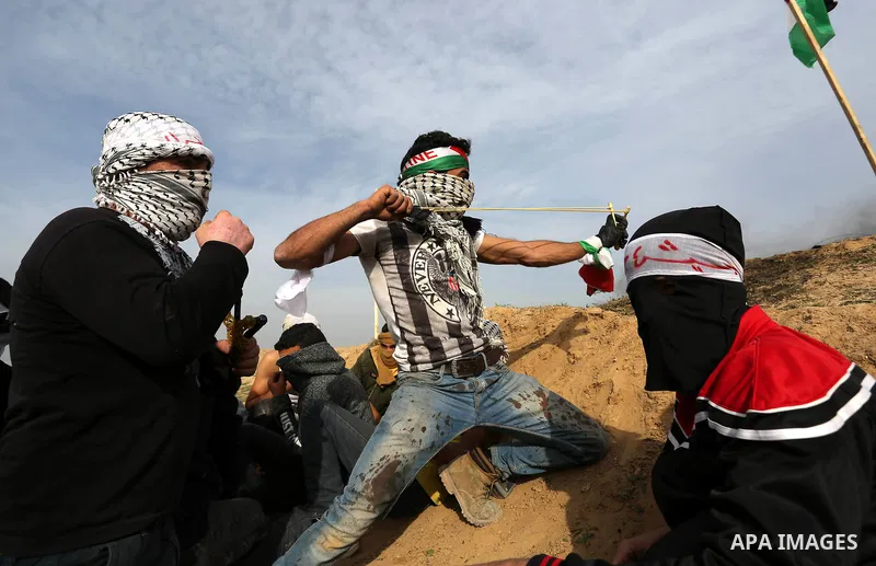 Palestinian protesters clash with Israeli security forces as demonstrations continue over US President Donald Trump's declaration of Jerusalem as Israel's capital near the border with Israel in the southern Gaza Strip Fe...