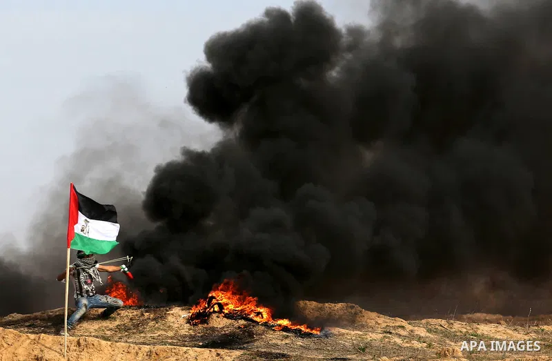 Palestinian protesters clash with Israeli security forces as demonstrations continue over US President Donald Trump's declaration of Jerusalem as Israel's capital near the border with Israel in the southern Gaza Strip Fe...