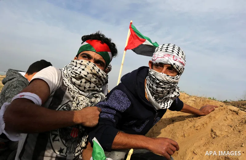 Palestinian protesters clash with Israeli security forces as demonstrations continue over US President Donald Trump's declaration of Jerusalem as Israel's capital near the border with Israel in the southern Gaza Strip Fe...