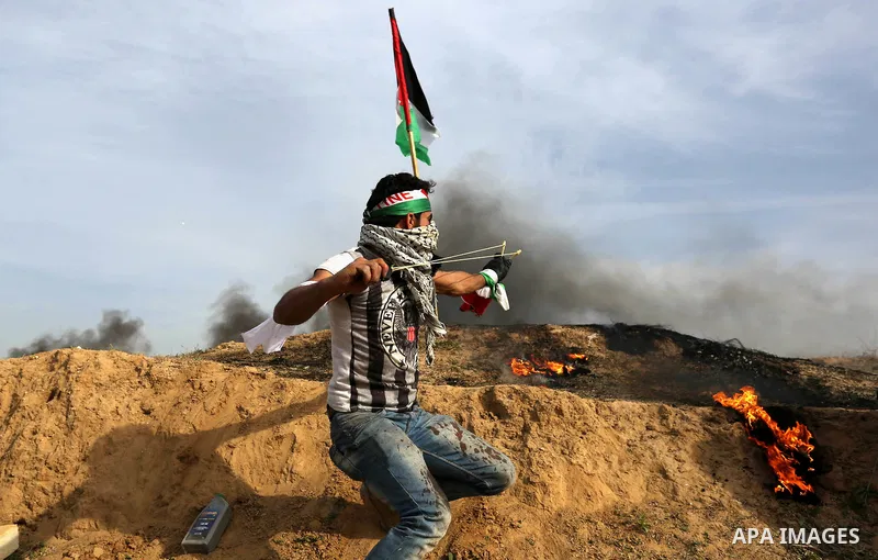 Palestinian protesters clash with Israeli security forces as demonstrations continue over US President Donald Trump's declaration of Jerusalem as Israel's capital near the border with Israel in the southern Gaza Strip Fe...
