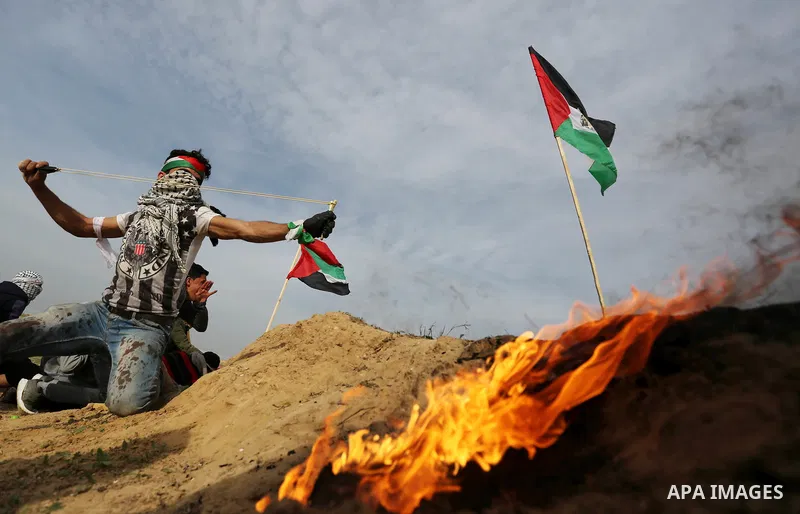 Palestinian protesters clash with Israeli security forces as demonstrations continue over US President Donald Trump's declaration of Jerusalem as Israel's capital near the border with Israel in the southern Gaza Strip Fe...