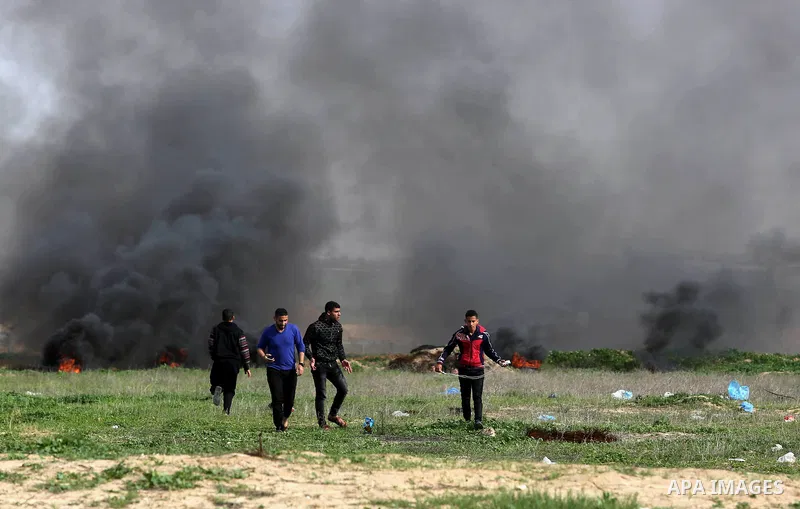 Palestinian protesters clash with Israeli security forces as demonstrations continue over US President Donald Trump's declaration of Jerusalem as Israel's capital near the border with Israel in the southern Gaza Strip Fe...