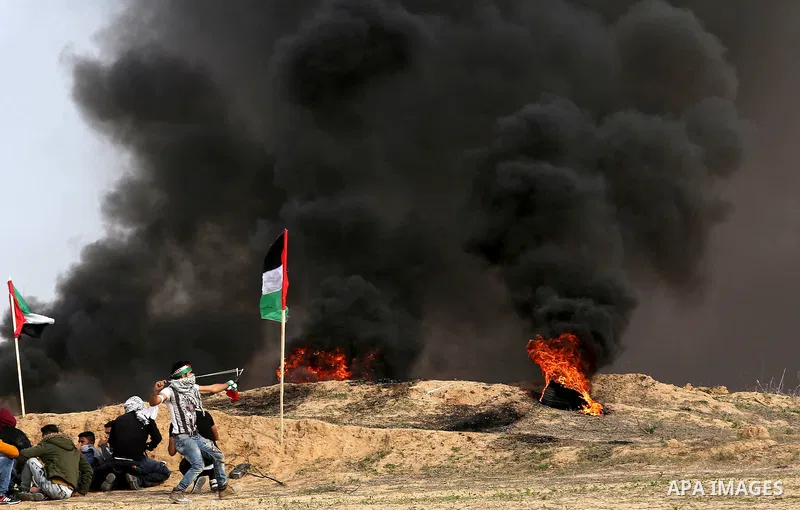 Palestinian protesters clash with Israeli security forces as demonstrations continue over US President Donald Trump's declaration of Jerusalem as Israel's capital near the border with Israel in the southern Gaza Strip Fe...