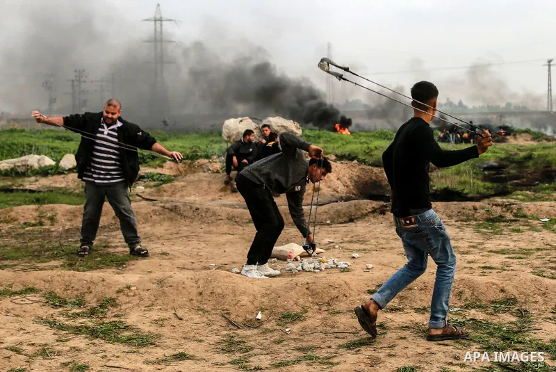 Palestinian protesters clash with Israeli security forces as demonstrations continue over US President Donald Trump's declaration of Jerusalem as Israel's capital near the border with Israel east of Gaza City February 9,...