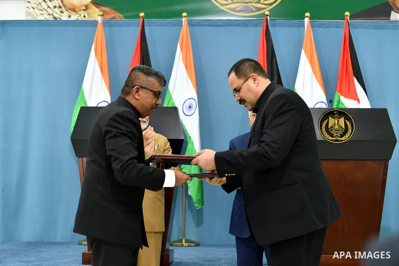 Palestinian President Mahmoud Abbas and Indian Prime Minister Narendra Modi, attend the signature of cooperation following their meeting in the West Bank city of Ramallah on February 10, 2018. Modi became the first India...