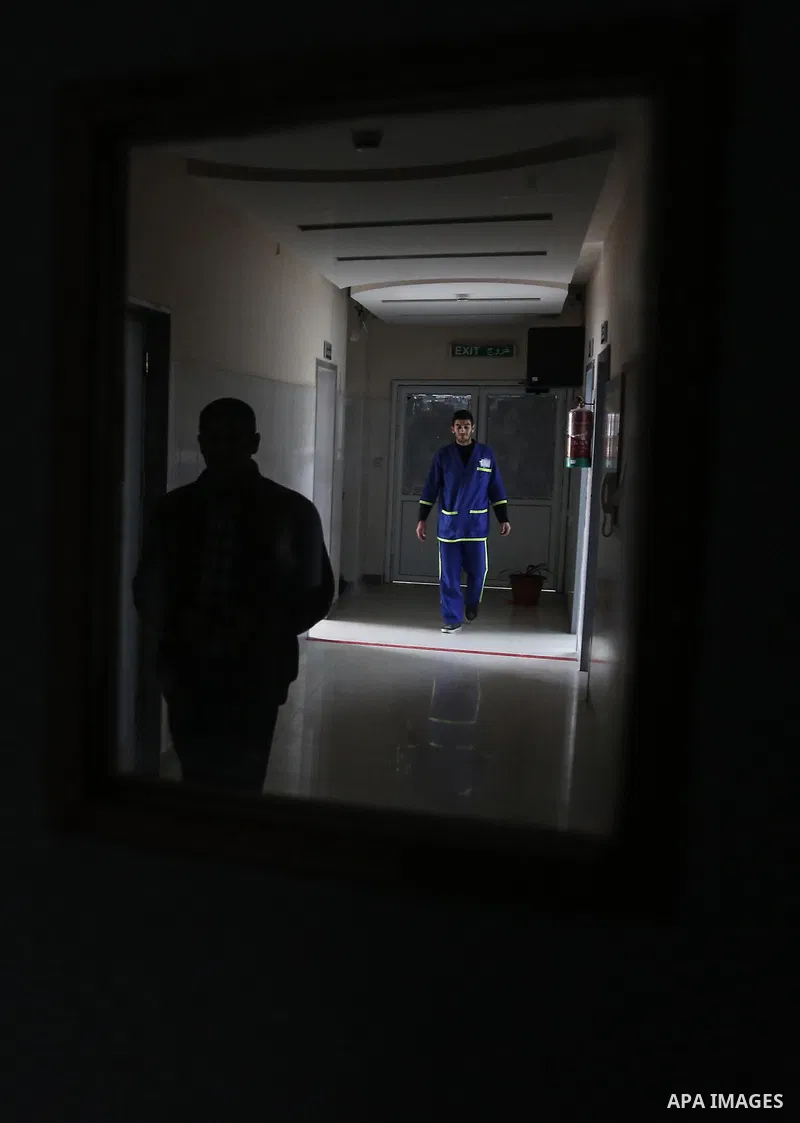 Employees of the Palestinian health ministry check the Durra hospital in Gaza City on February 11, 2018 after it ran out of fuel. Seven medical centers in Gaza have stopped services due to lack of fuel to power generator...