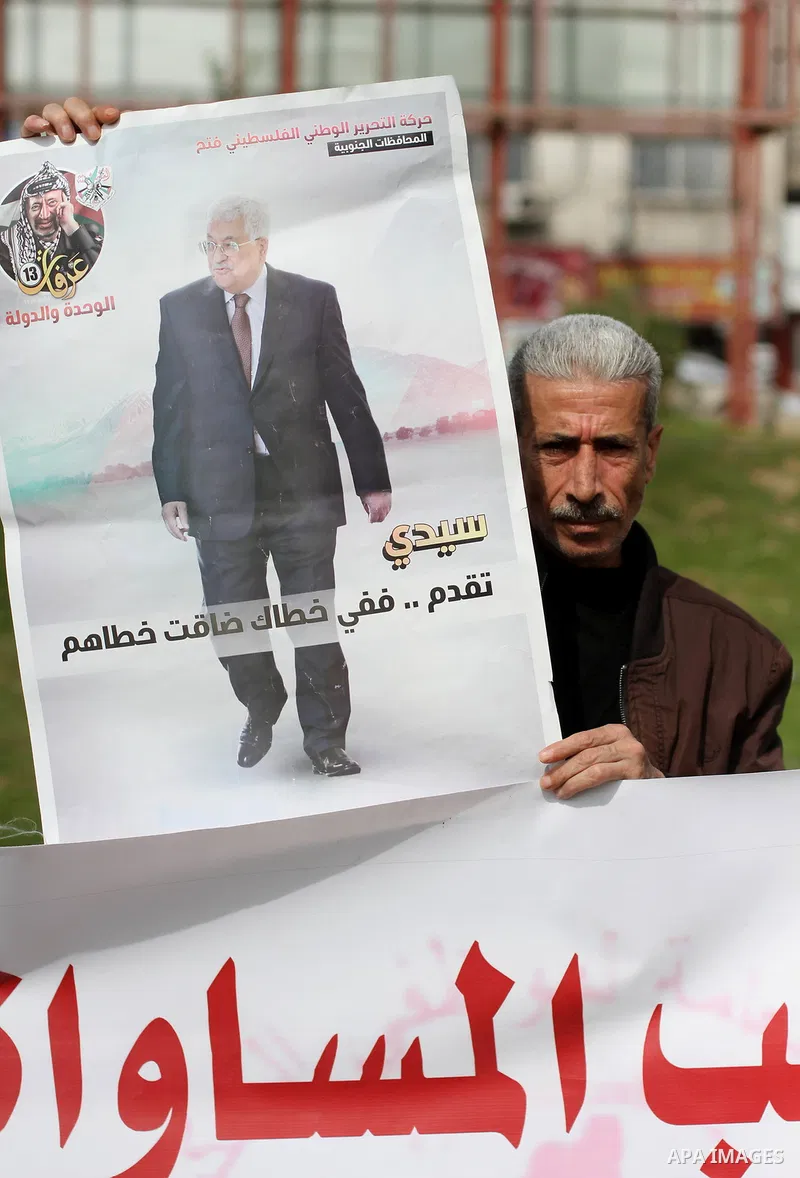 The Palestinian Authority employees in the Gaza Strip take part in a protest demanding their right after Palestinian Authority force them into early retirement in Gaza city on February 12, 2018. Photo by Mahmoud Ajour