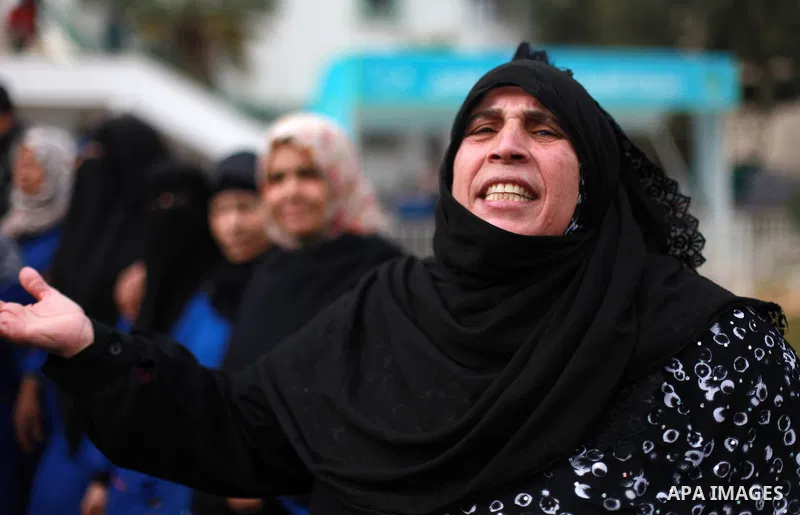Palestinian cleaners take part in a protest to demand their salaries, at al-Shifa hospital in Gaza City on February 12, 2018. Photo by Mahmoud Ajour