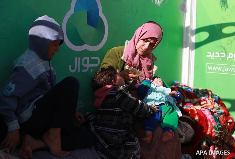 The wife of Fadel al-Deree and her family stay at their tent in Gaza City, on February 13, 2018. The 55-year-old Fadel, his wife and their eight children left their apartment, where they lived for twelve years, after Fad...