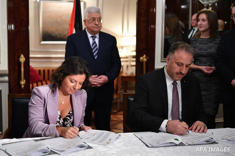 Palestinian President Mahmoud Abbas attends the signature of cooperation with RT agency in Moscow, Russia February 13, 2018. Photo by Thaer Ganaim