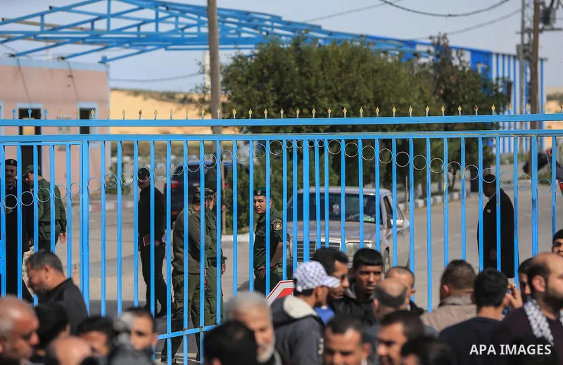 Palestinians take part in a protest against the siege on the Gaza Strip, at Erez crossing, in the northern Gaza Strip on February 14, 2018. Israel has maintained a siege on Gaza for a decade which it says is necessary to...