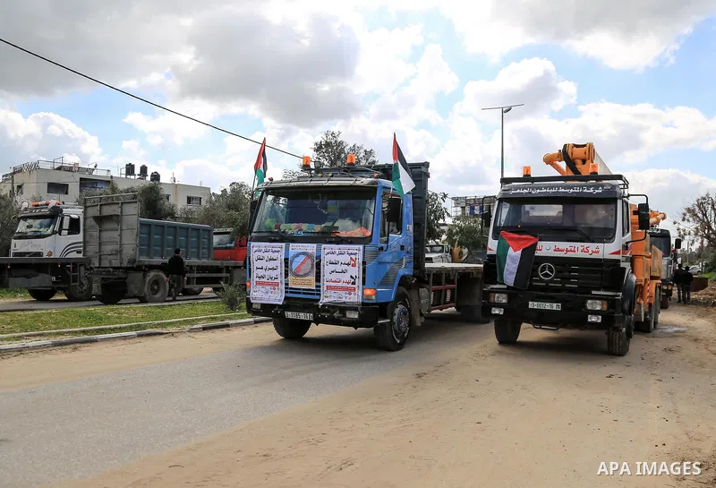 Palestinian truck drivers take part in a protest against the siege on the Gaza Strip, at Erez crossing, in the northern Gaza Strip on February 14, 2018. Israel has maintained a siege on Gaza for a decade which it says is...