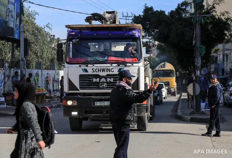 Palestinian truck drivers take part in a protest against the siege on the Gaza Strip, at Erez crossing, in the northern Gaza Strip on February 14, 2018. Israel has maintained a siege on Gaza for a decade which it says is...