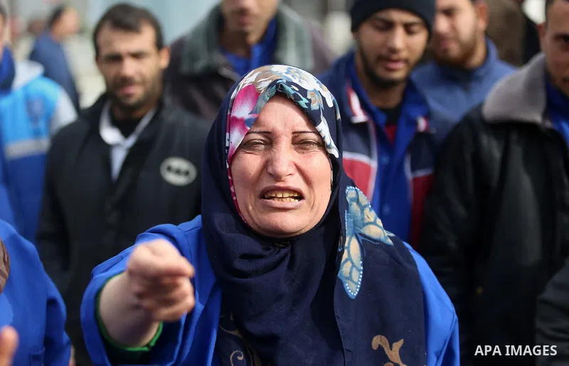 Palestinian employees of the Ministry of Health take part in a protest demanding their rights and against deterioration of health conditions, at al-Shifa hospital in Gaza City on February 15, 2018. Photo by Atia Darwish