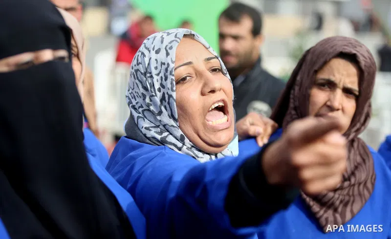 Palestinian employees of the Ministry of Health take part in a protest demanding their rights and against deterioration of health conditions, at al-Shifa hospital in Gaza City on February 15, 2018. Photo by Atia Darwish