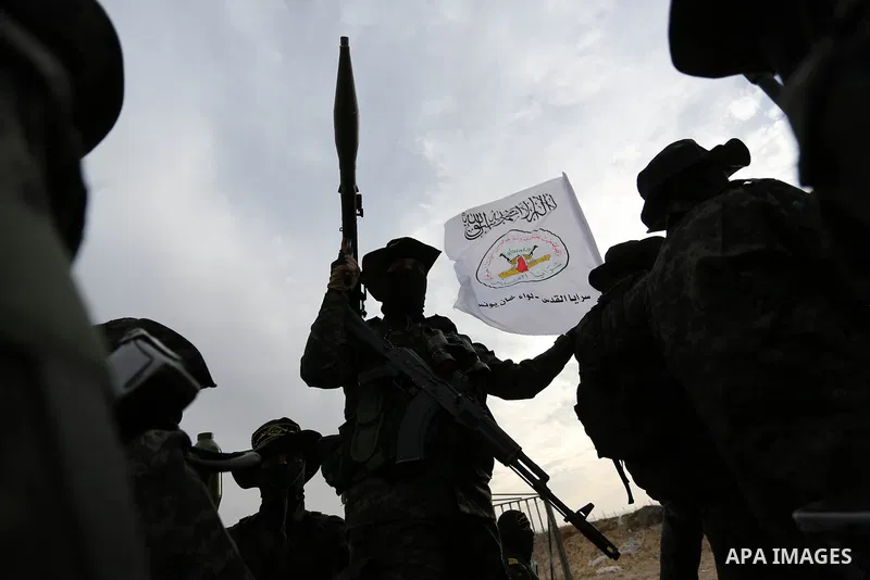 Palestinian Islamic Jihad militants take part in a military show in Khan Younis in the southern Gaza Strip February 15, 2018. Photo by Ashraf Amra