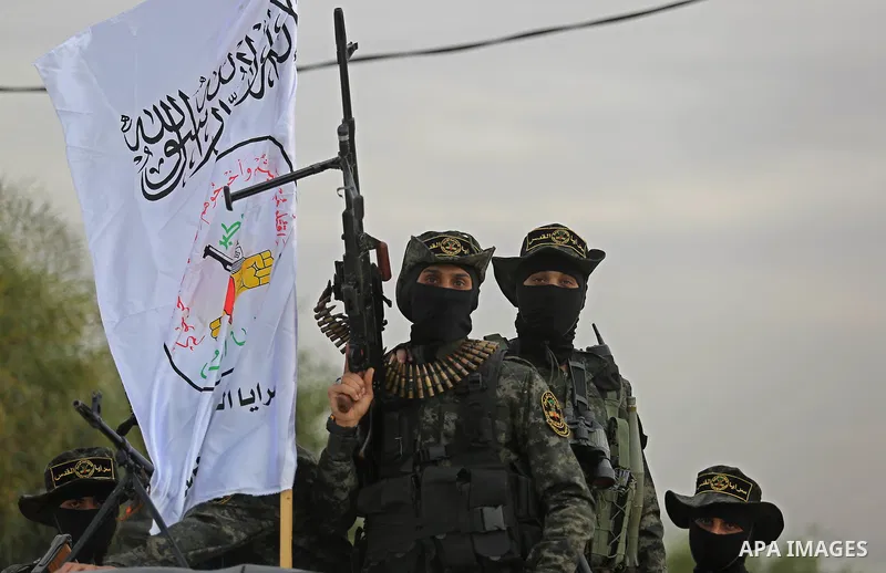 Palestinian Islamic Jihad militants take part in a military show in Khan Younis in the southern Gaza Strip February 15, 2018. Photo by Ashraf Amra