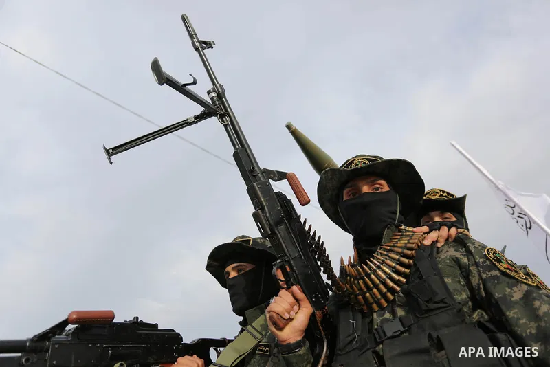 Palestinian Islamic Jihad militants take part in a military show in Khan Younis in the southern Gaza Strip February 15, 2018. Photo by Ashraf Amra