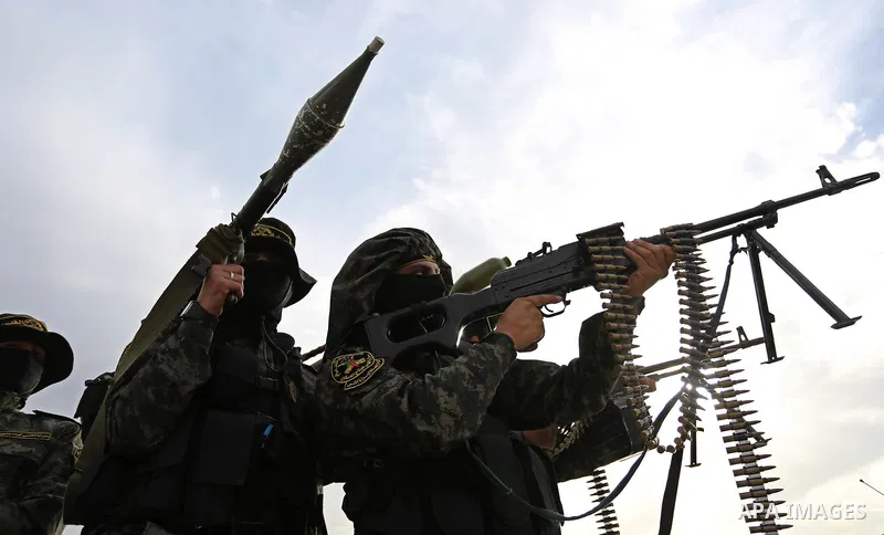 Palestinian Islamic Jihad militants take part in a military show in Khan Younis in the southern Gaza Strip February 15, 2018. Photo by Ashraf Amra