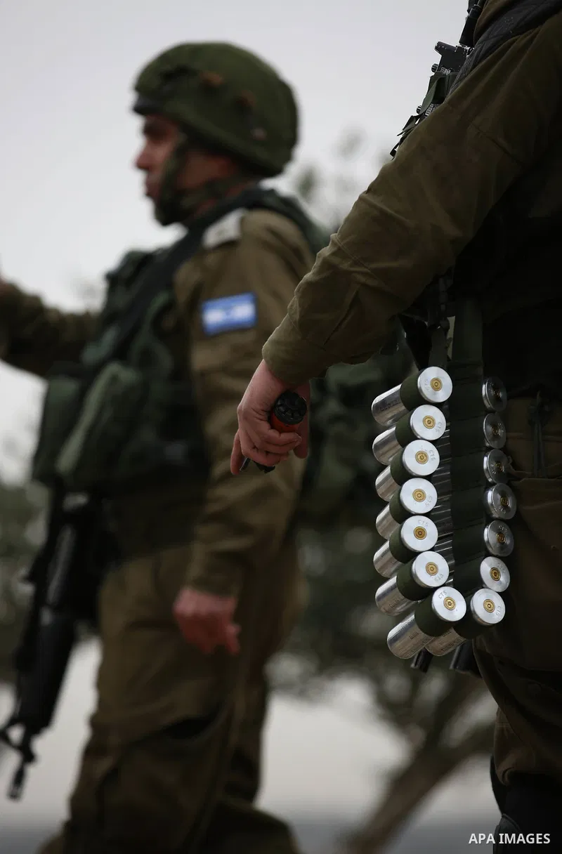 Israeli soldier fires tear gas grenades at Palestinians during clashes at the Beta village near the West Bank city of Nablus, 15 February 2018. According to local sources at least five Palestinian were injured during the...