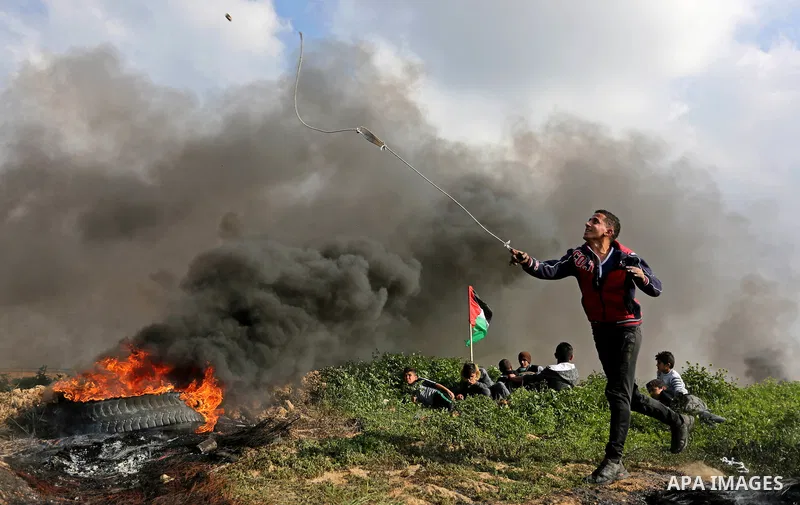 Palestinian protesters clash with Israeli security forces as demonstrations continue over US President Donald Trump's declaration of Jerusalem as Israel's capital near the border with Israel in the southern Gaza Strip Fe...