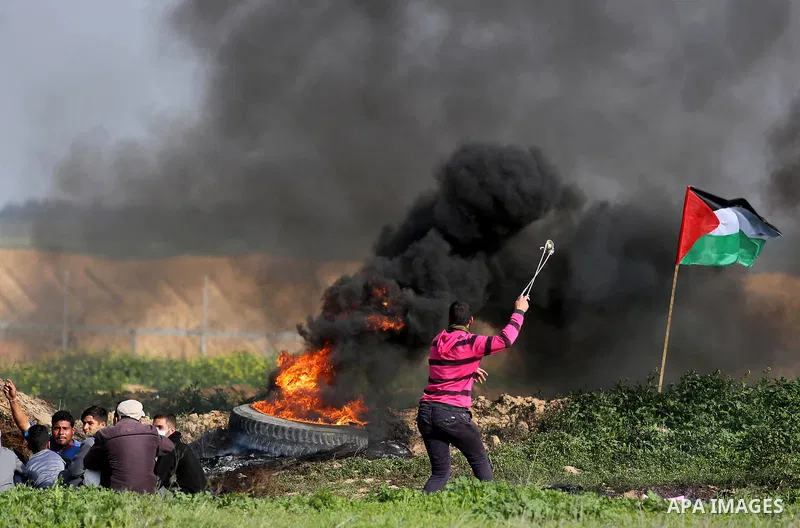 Palestinian protesters clash with Israeli security forces as demonstrations continue over US President Donald Trump's declaration of Jerusalem as Israel's capital near the border with Israel in the southern Gaza Strip Fe...