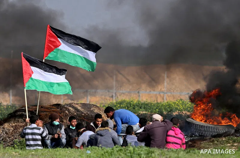 Palestinian protesters clash with Israeli security forces as demonstrations continue over US President Donald Trump's declaration of Jerusalem as Israel's capital near the border with Israel in the southern Gaza Strip Fe...