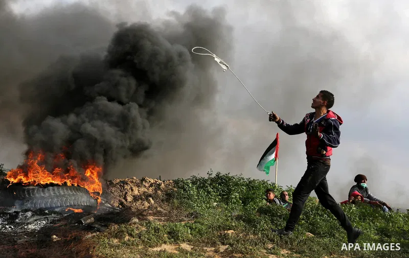 Palestinian protesters clash with Israeli security forces as demonstrations continue over US President Donald Trump's declaration of Jerusalem as Israel's capital near the border with Israel in the southern Gaza Strip Fe...