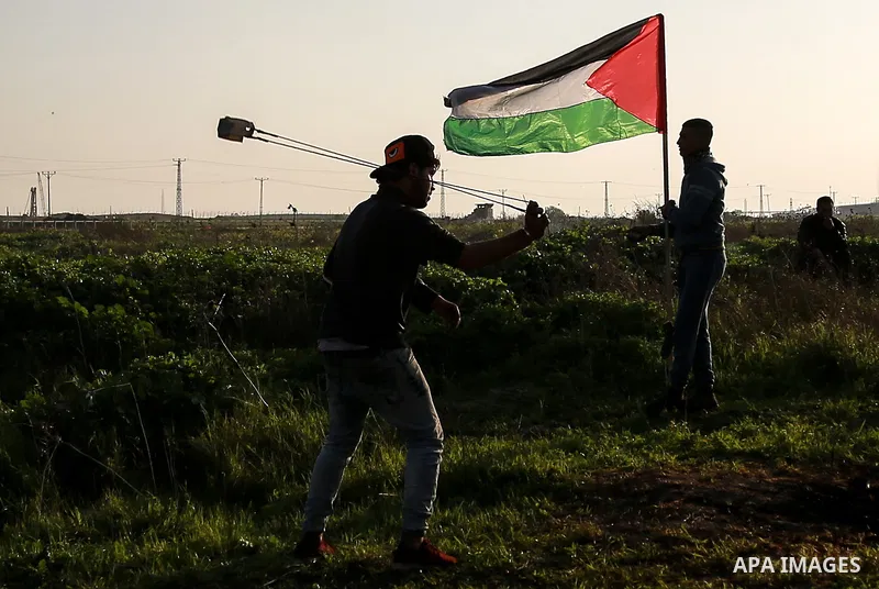 Palestinian protesters clash with Israeli security forces as demonstrations continue over US President Donald Trump's declaration of Jerusalem as Israel's capital near the border with Israel east of Gaza city February 16...