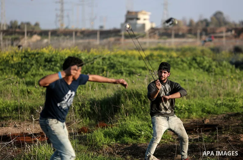 Palestinian protesters clash with Israeli security forces as demonstrations continue over US President Donald Trump's declaration of Jerusalem as Israel's capital near the border with Israel east of Gaza city February 16...