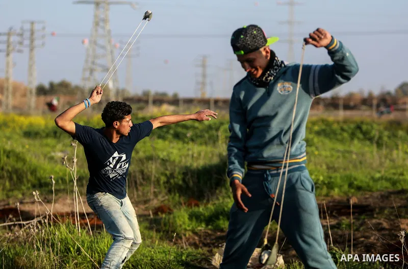 Palestinian protesters clash with Israeli security forces as demonstrations continue over US President Donald Trump's declaration of Jerusalem as Israel's capital near the border with Israel east of Gaza city February 16...