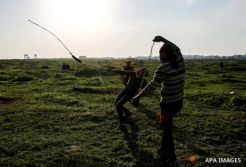 Palestinian protesters clash with Israeli security forces as demonstrations continue over US President Donald Trump's declaration of Jerusalem as Israel's capital near the border with Israel east of Gaza city February 16...