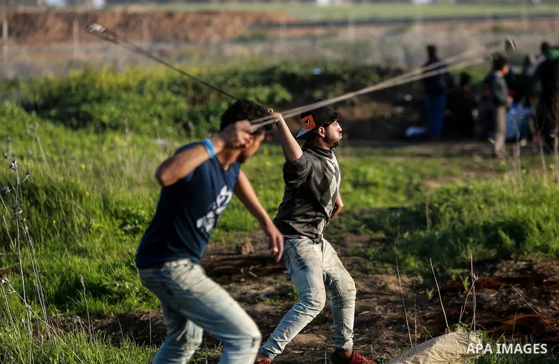 Palestinian protesters clash with Israeli security forces as demonstrations continue over US President Donald Trump's declaration of Jerusalem as Israel's capital near the border with Israel east of Gaza city February 16...