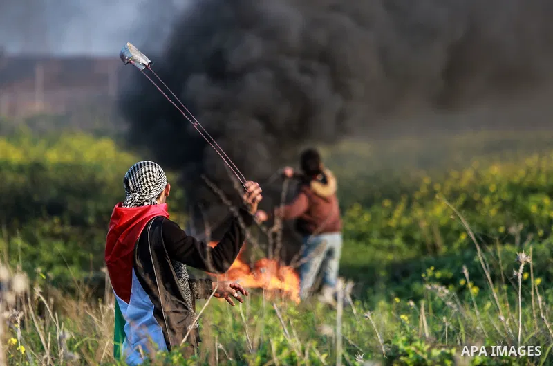 Palestinian protesters clash with Israeli security forces as demonstrations continue over US President Donald Trump's declaration of Jerusalem as Israel's capital near the border with Israel east of Gaza city February 16...