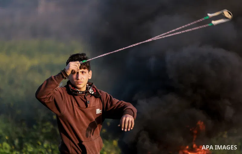 Palestinian protesters clash with Israeli security forces as demonstrations continue over US President Donald Trump's declaration of Jerusalem as Israel's capital near the border with Israel east of Gaza city February 16...