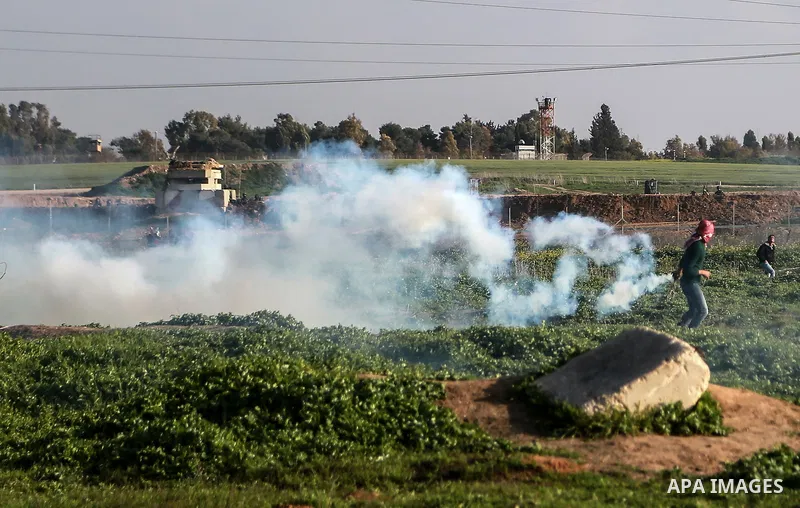 Palestinian protesters clash with Israeli security forces as demonstrations continue over US President Donald Trump's declaration of Jerusalem as Israel's capital near the border with Israel east of Gaza city February 16...