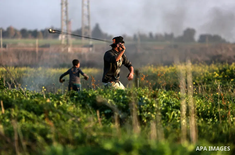 Palestinian protesters clash with Israeli security forces as demonstrations continue over US President Donald Trump's declaration of Jerusalem as Israel's capital near the border with Israel east of Gaza city February 16...