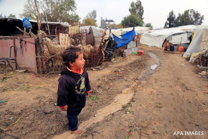 Palestinian children play outside of their family house in an impoverished area in Gaza City on February 18, 2018. Photo by Dawoud Abo Alkas