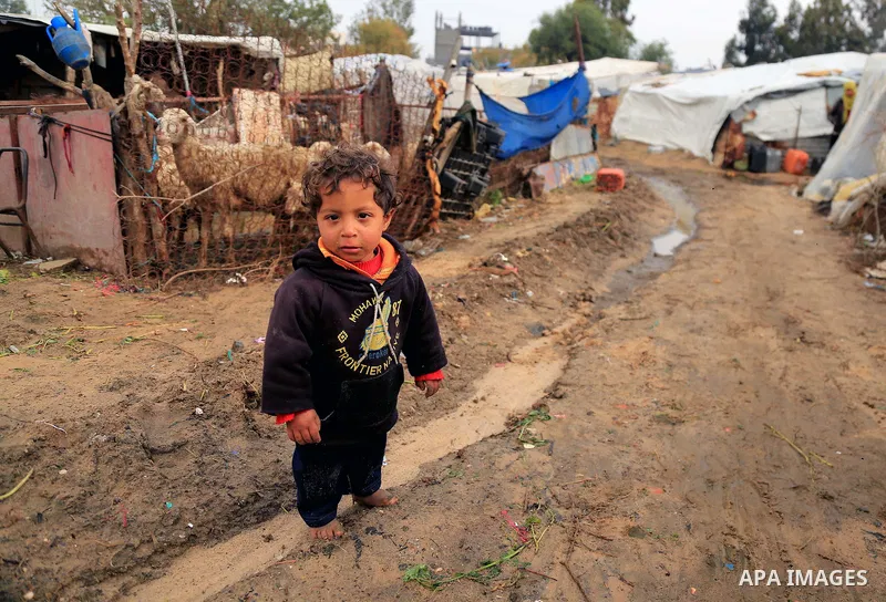 Palestinian children play outside of their family house in an impoverished area in Gaza City on February 18, 2018. Photo by Dawoud Abo Alkas