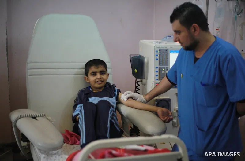 A Palestinian patient undergos kidney dialysis at Al-Rantisi hospital in Gaza city on February 19, 2018. A senior United Nations official in January warned the Palestinian coastal enclave of the Gaza Strip was on the ver...