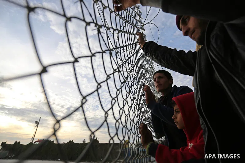 Palestinians wait for their relatives to return into Gaza after the Egyptian Authority opened the Rafah Border Crossing for one day, in the southern Gaza Strip February 19, 2018. Photo by Ashraf Amra