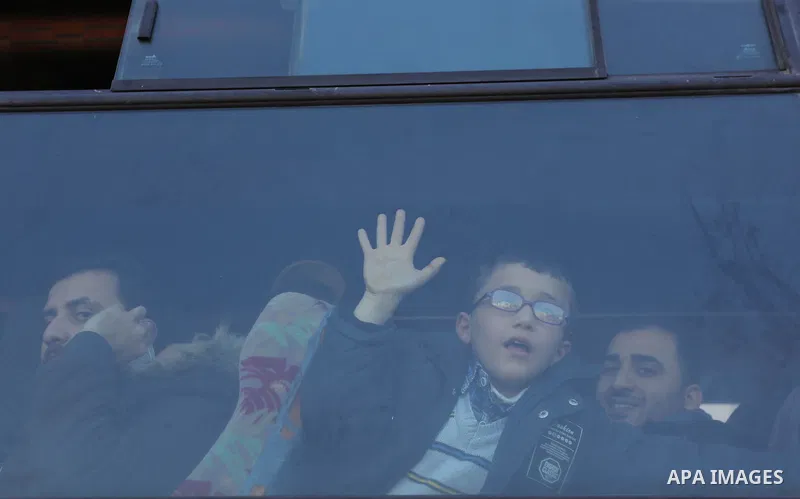 Palestinians wait for permission to cross into Egypt through the Rafah border crossing in the southern Gaza Strip after it was opened by Egyptian authorities on February 21, 2018. Both Israel and Egypt have maintained bl...