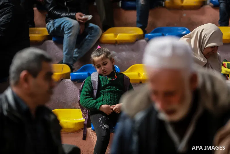 Palestinians wait for permission to cross into Egypt through the Rafah border crossing in the southern Gaza Strip after it was opened by Egyptian authorities on February 21, 2018. Both Israel and Egypt have maintained bl...