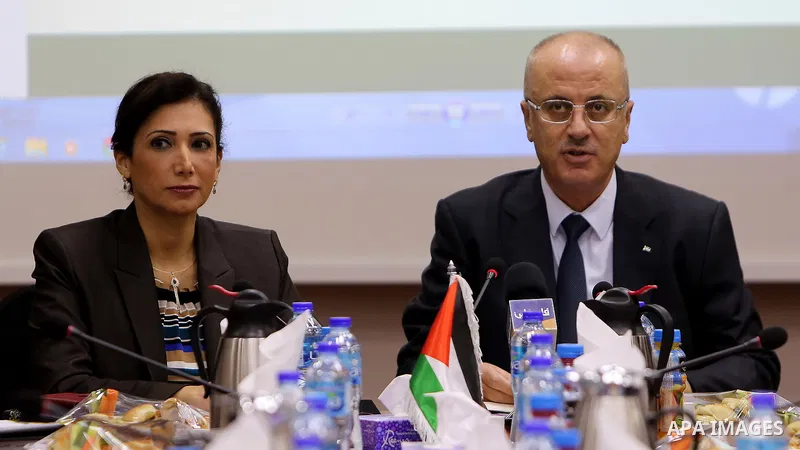 Palestinian Prime Minister Rami Hamdallah chairs the 20th Meeting of the Advisory Council for Official Statistics in the West Bank city of Ramallah, on February 22, 2018. Photo by Prime Minister Office